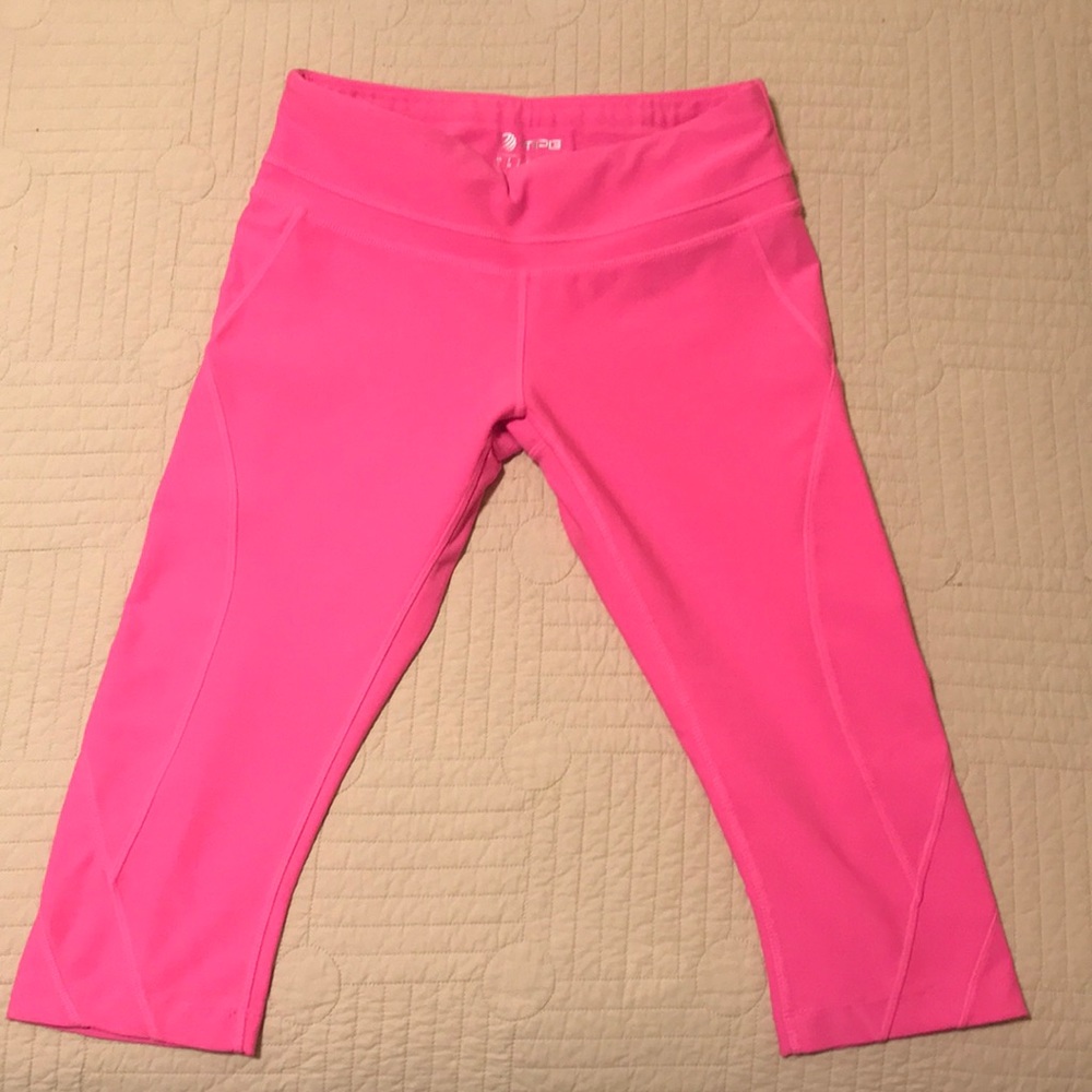 Neon pink MPG cropped work out pants.